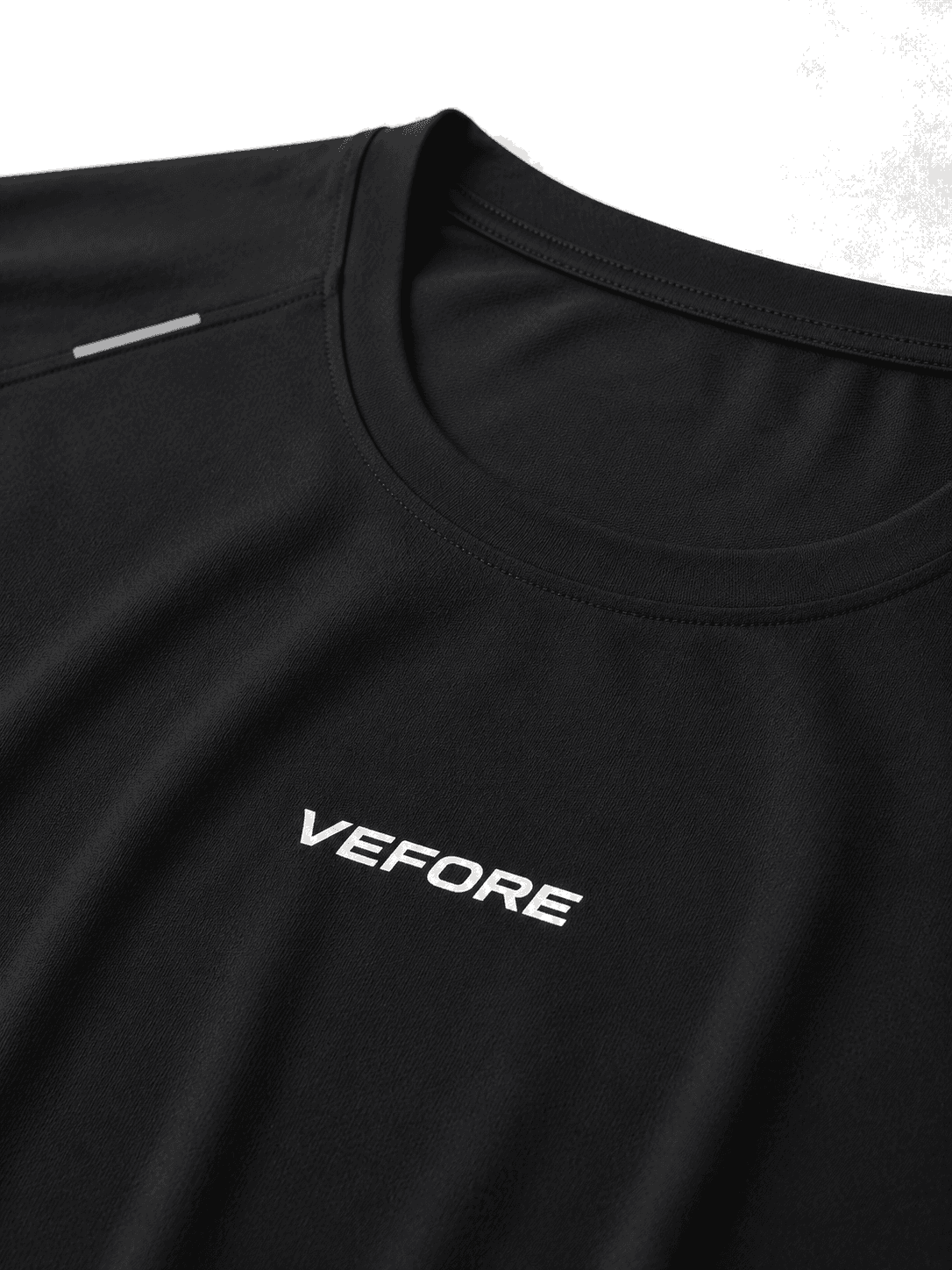 Motion Reflective Tee — chest wordmark and reflective detail